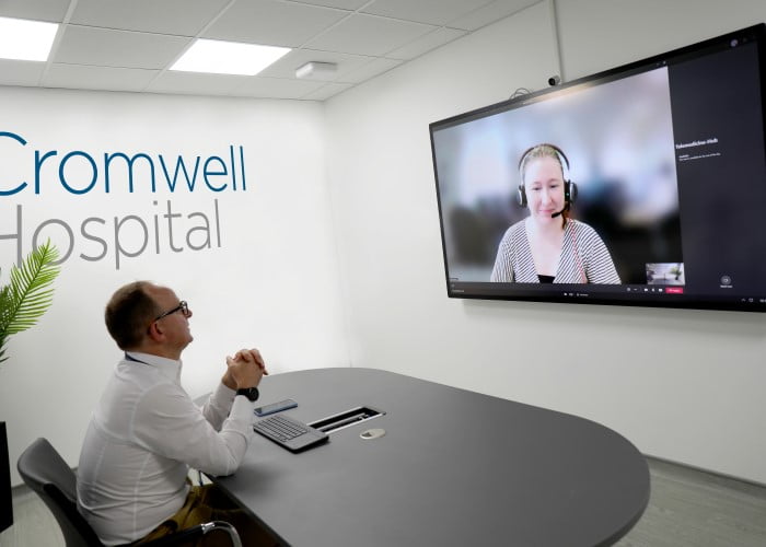 Consultant using the Garrick Hospital telemedicine suite